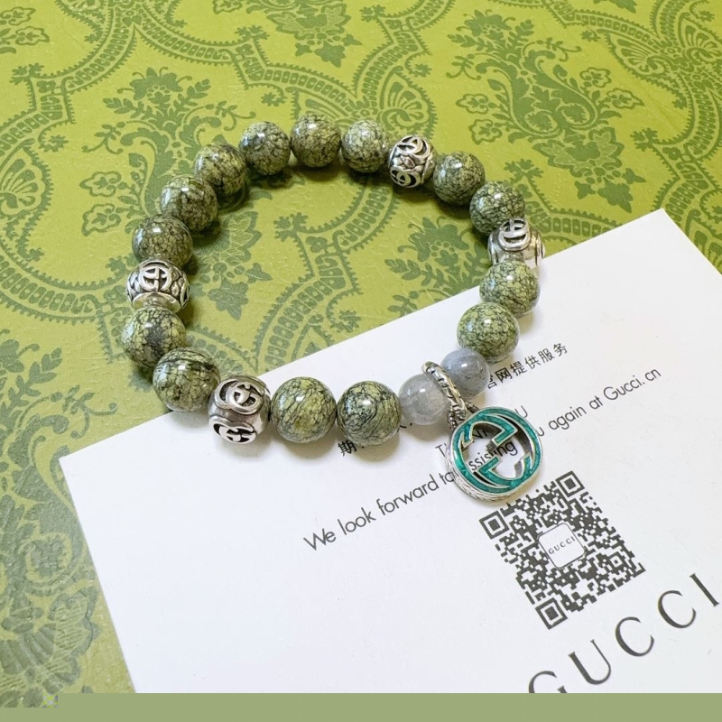 G*u*i bracelets
